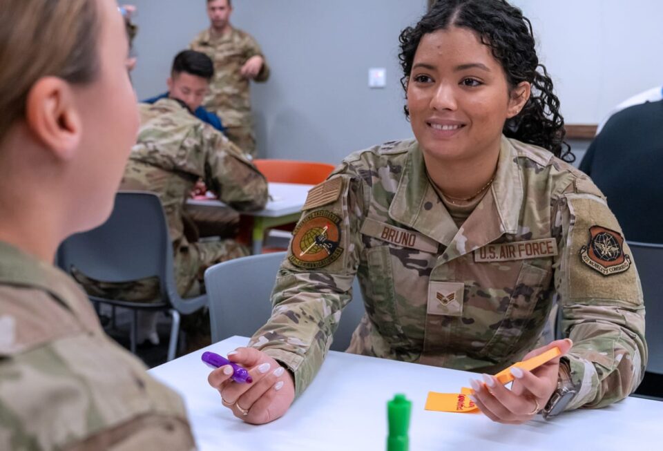 Airman sitting at a table